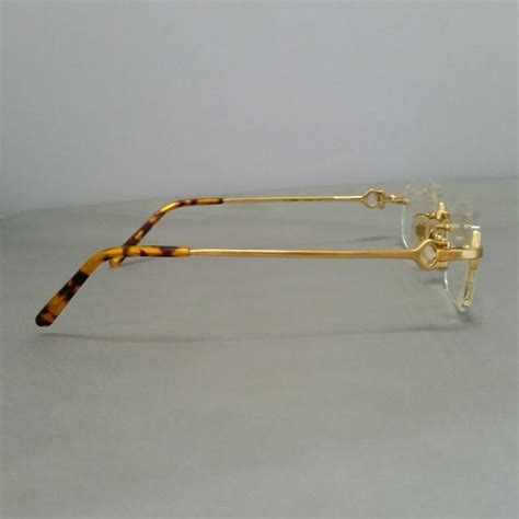 18k solid gold eyeglasses frames.